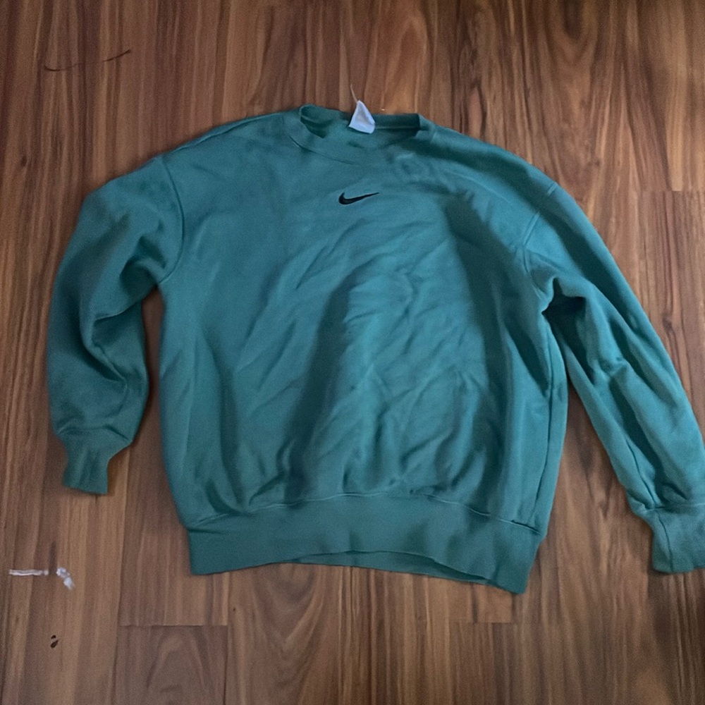 A Nike green cowl turtle neck sweater